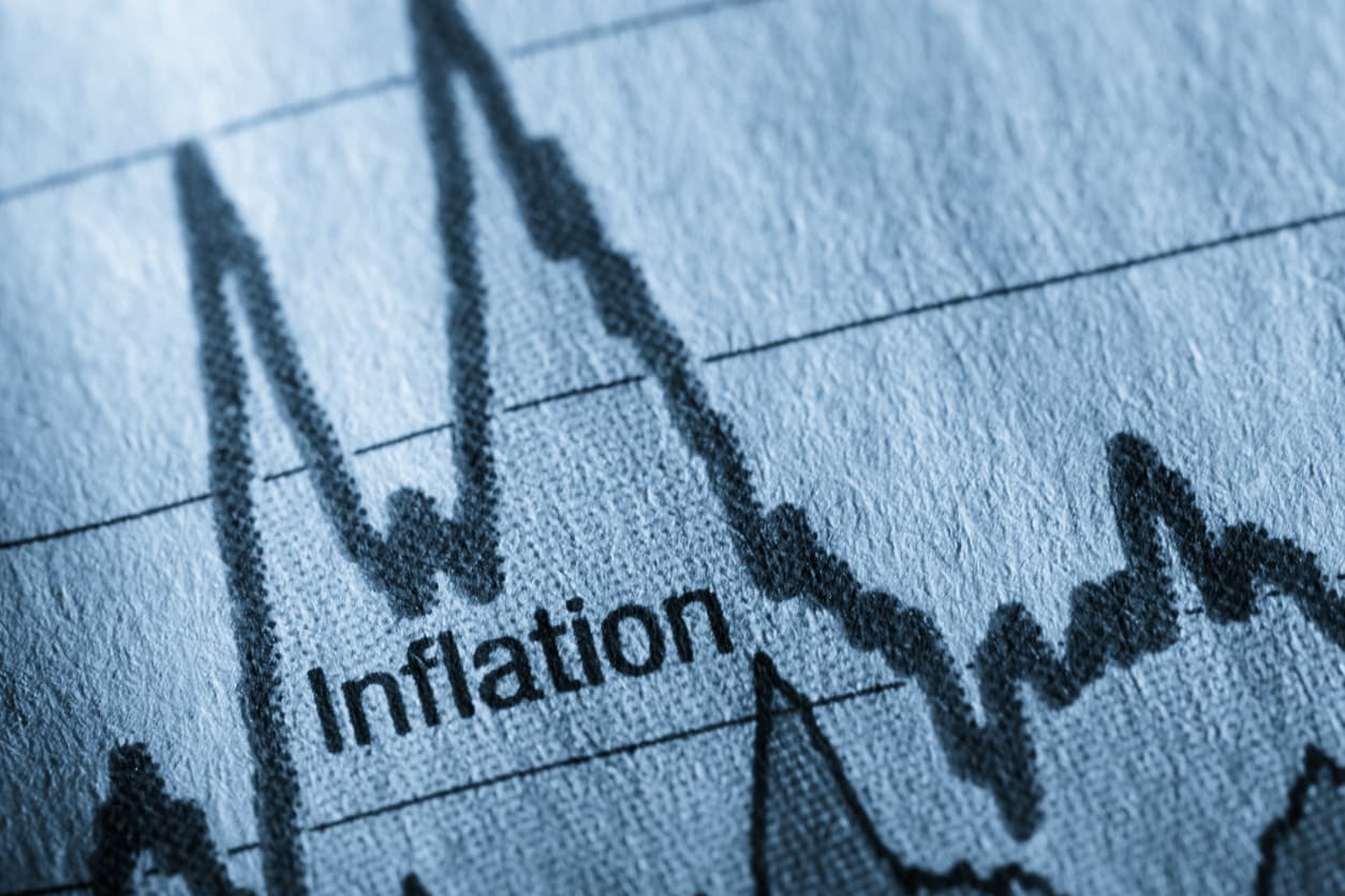 A piece of paper showing a graph with the word inflation written underneath it