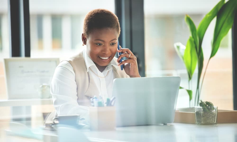 A businessperson listening to a customer giving feedback.