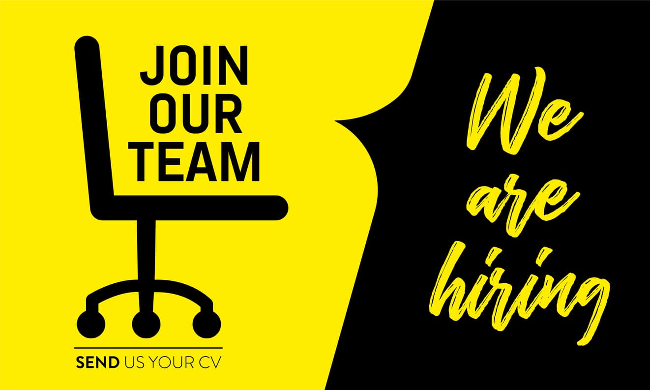 Black and yellow sign saying “we are hiring” and “join our team” with an office chair drawing.