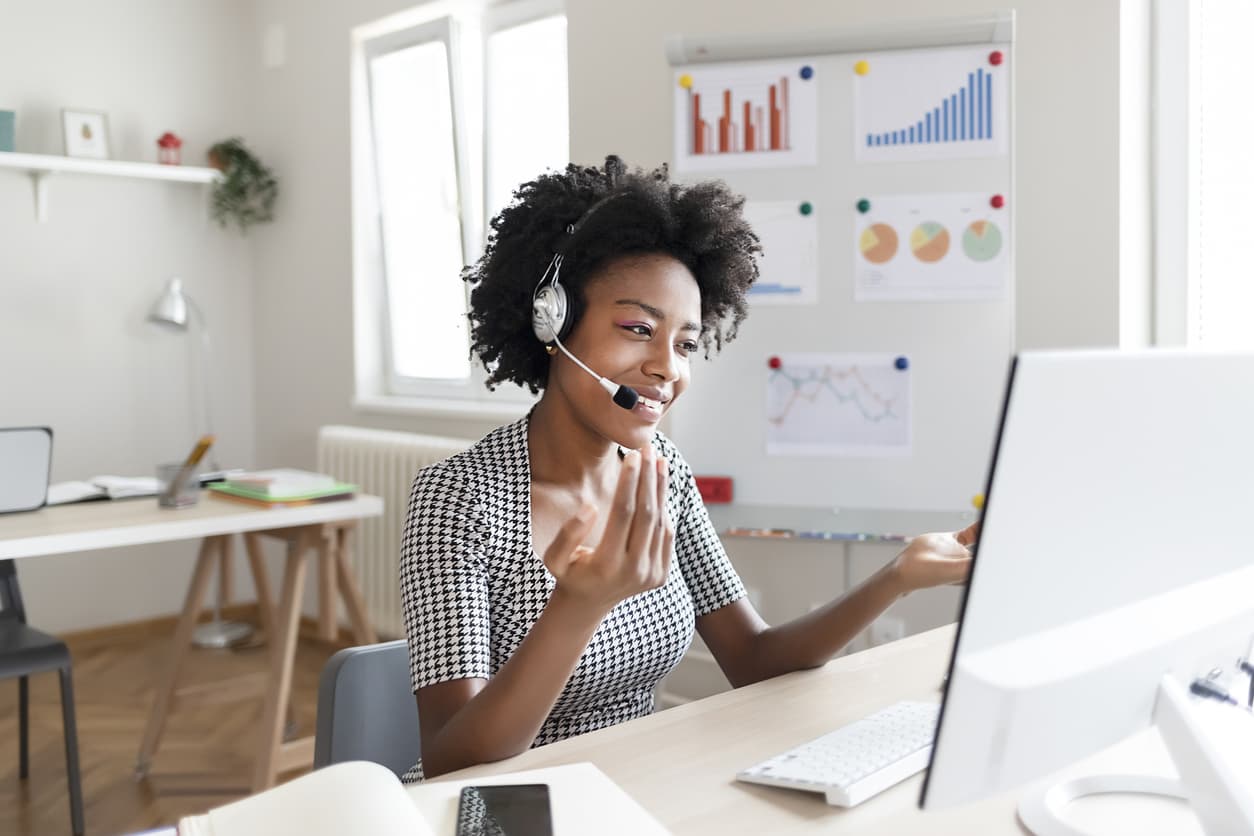 A customer support person talking to a client over a call